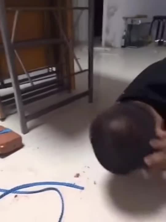 An Asian man destroyed his own face with a brick.