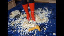 Jana shreds a fabric chicken with her red stiletto patent boots trailer